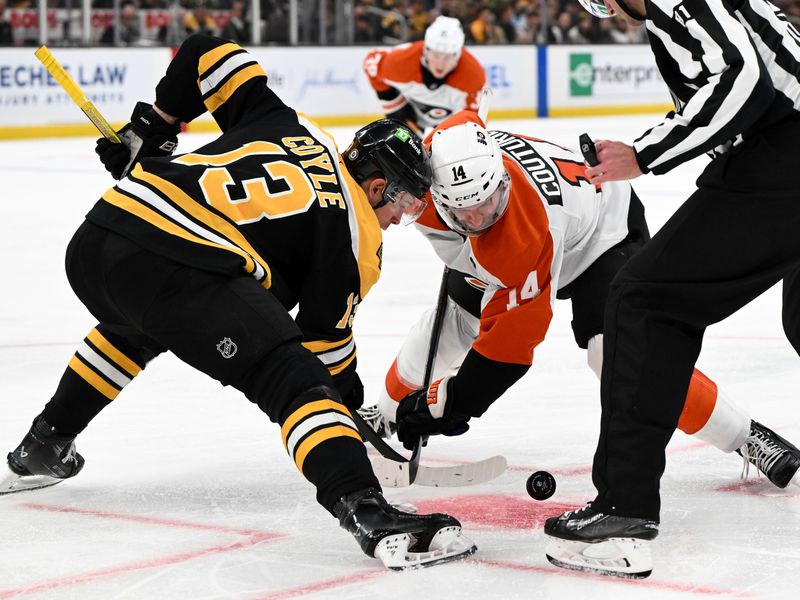 Oct 29, 2024; Boston, Massachusetts, USA; Boston Bruins center Charlie Coyle (13) and Philadelphia Flyers center Sean Couturier (14) take a face-off during the second period at TD Garden. Mandatory Credit: Brian Fluharty-Imagn Images