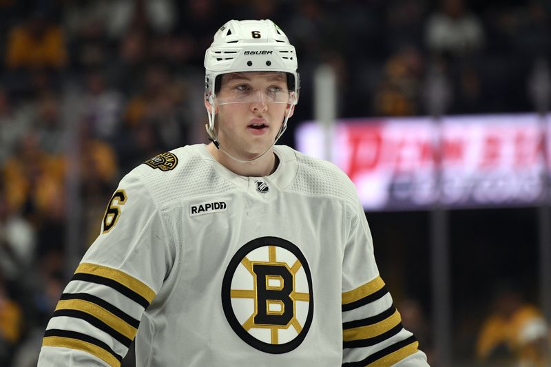 Apr 2, 2024; Nashville, Tennessee, USA; Boston Bruins defenseman Mason Lohrei (6) waits for a face off during the second period against the Nashville Predators at Bridgestone Arena. Mandatory Credit: Christopher Hanewinckel-USA TODAY Sports