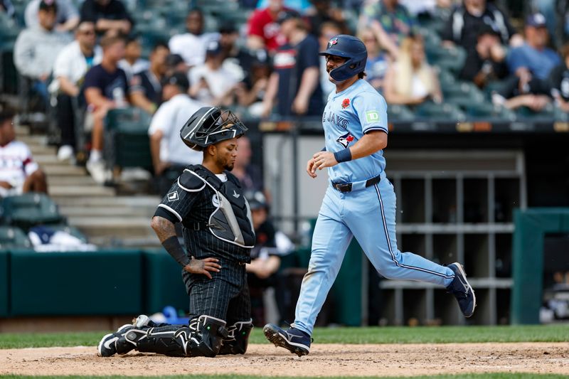 May 27, 2024; Chicago, Illinois, USA; Toronto Blue Jays outfielder Davis Schneider (36) crosses home plate after hitting a two-run home run against the Chicago White Sox during the ninth inning at Guaranteed Rate Field. Mandatory Credit: Kamil Krzaczynski-USA TODAY Sports