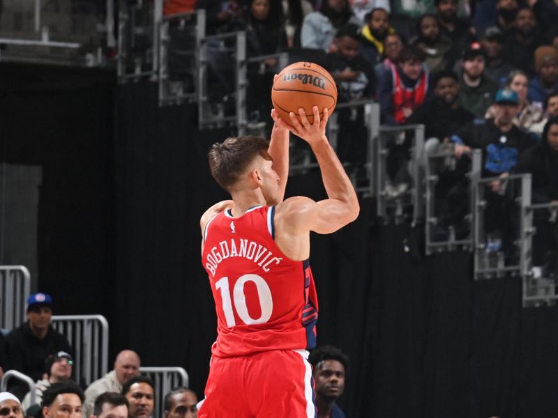 DETROIT, MI - FEBRUARY 24: Bogdan Bogdanovic #10 of the LA Clippers shoots the ball during the game against the Detroit Pistons on February 24, 2025 at Little Caesars Arena in Detroit, Michigan. NOTE TO USER: User expressly acknowledges and agrees that, by downloading and/or using this photograph, User is consenting to the terms and conditions of the Getty Images License Agreement. Mandatory Copyright Notice: Copyright 2025 NBAE (Photo by Chris Schwegler/NBAE via Getty Images)