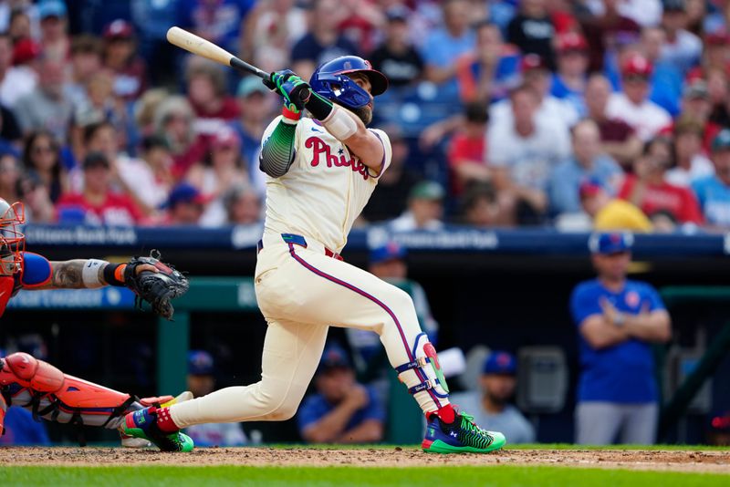 Sep 14, 2024; Philadelphia, Pennsylvania, USA; Philadelphia Phillies first baseman Bryce Harper (3) hits a home run against the New York Mets during the sixth inning at Citizens Bank Park. Mandatory Credit: Gregory Fisher-Imagn Images