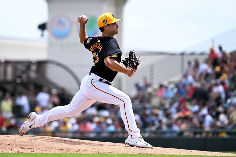 Mar 25, 2024; Bradenton, Florida, USA; Pittsburgh Pirates starting pitcher Marco Gonzalez (27) throws a pitch in the first inning of the spring training game against the Toronto Blue Jays at LECOM Park. Mandatory Credit: Jonathan Dyer-USA TODAY Sports