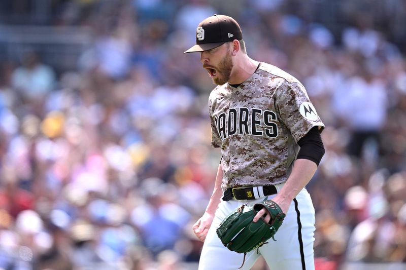 Jul 30, 2023; San Diego, California, USA; San Diego Padres relief pitcher Steven Wilson (36) reacts after an inning-ending double play during the seventh inning against the Texas Rangers at Petco Park. Mandatory Credit: Orlando Ramirez-USA TODAY Sports