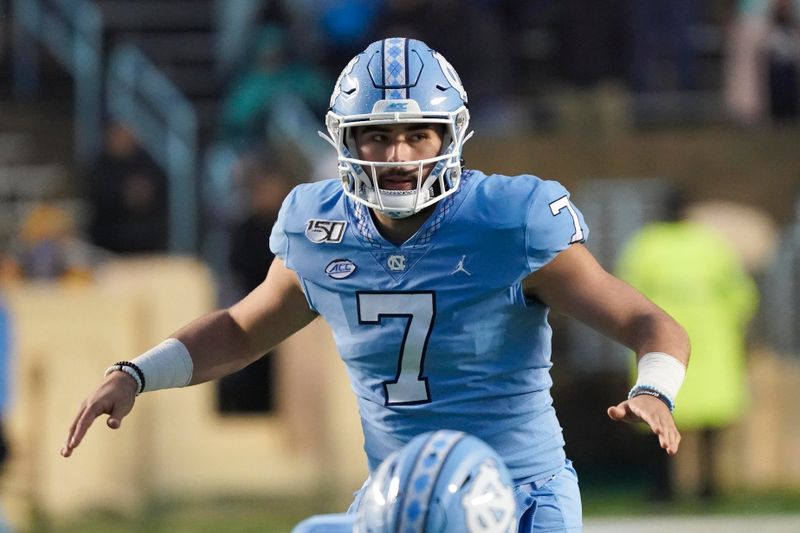 Nov 23, 2019; Chapel Hill, NC, USA;  North Carolina Tar Heels quarterback Sam Howell (7) waits for the snap during the first half against the Mercer Bears at Kenan Memorial Stadium. The North Carolina Tar Heels defeated the Mercer Bears 56-7. Mandatory Credit: James Guillory-USA TODAY Sports