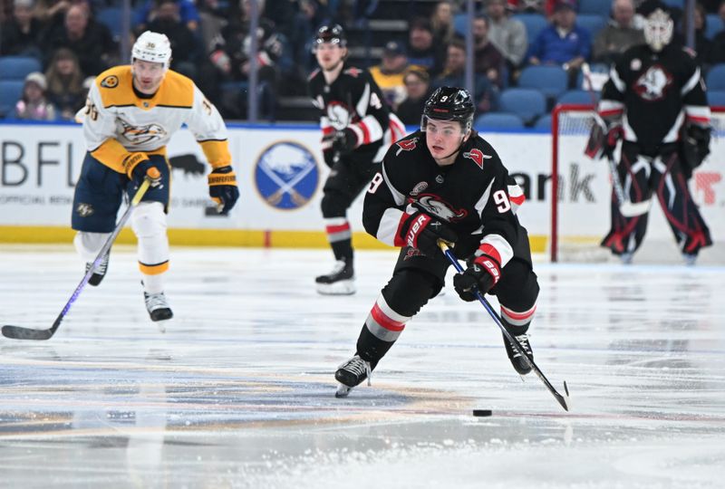 Jan 31, 2025; Buffalo, New York, USA; Buffalo Sabres left wing Zach Benson (9) skates with the puck against the Nashville Predators in the second period at the KeyBank Center. Mandatory Credit: Mark Konezny-Imagn Images