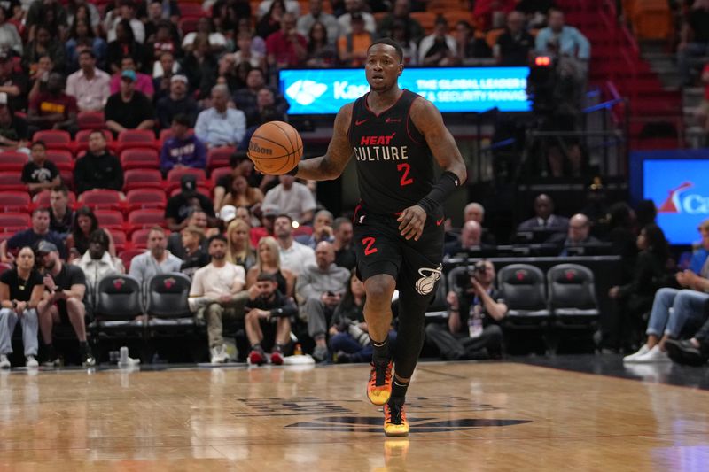 MIAMI, FL - MARCH 13: Terry Rozier #2 of the Miami Heat dribbles the ball during the game against the Denver Nuggets on March 13, 2024 at Kaseya Center in Miami, Florida. NOTE TO USER: User expressly acknowledges and agrees that, by downloading and or using this Photograph, user is consenting to the terms and conditions of the Getty Images License Agreement. Mandatory Copyright Notice: Copyright 2024 NBAE (Photo by Eric Espada/NBAE via Getty Images)