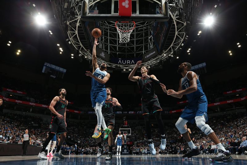 MINNEAPOLIS, MN -  APRIL 9:  Jordan McLaughlin #6 of the Minnesota Timberwolves drives to the basket during the game against the Washington Wizards on April 9, 2024 at Target Center in Minneapolis, Minnesota. NOTE TO USER: User expressly acknowledges and agrees that, by downloading and or using this Photograph, user is consenting to the terms and conditions of the Getty Images License Agreement. Mandatory Copyright Notice: Copyright 2024 NBAE (Photo by David Sherman/NBAE via Getty Images)