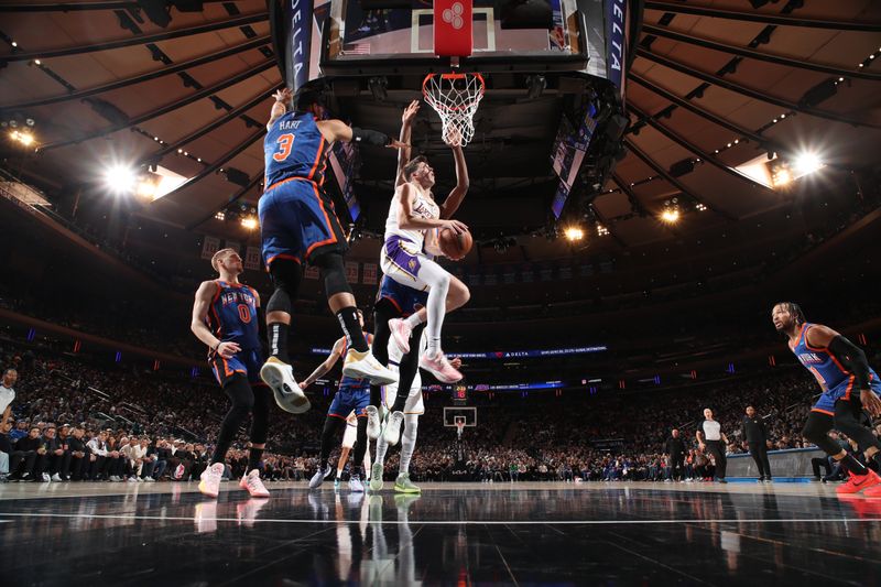 NEW YORK, NY - FEBRUARY 3: Austin Reaves #15 of the Los Angeles Lakers drives to the basket during the game against the New York Knicks on February 3, 2024 at Madison Square Garden in New York City, New York.  NOTE TO USER: User expressly acknowledges and agrees that, by downloading and or using this photograph, User is consenting to the terms and conditions of the Getty Images License Agreement. Mandatory Copyright Notice: Copyright 2024 NBAE  (Photo by Nathaniel S. Butler/NBAE via Getty Images)