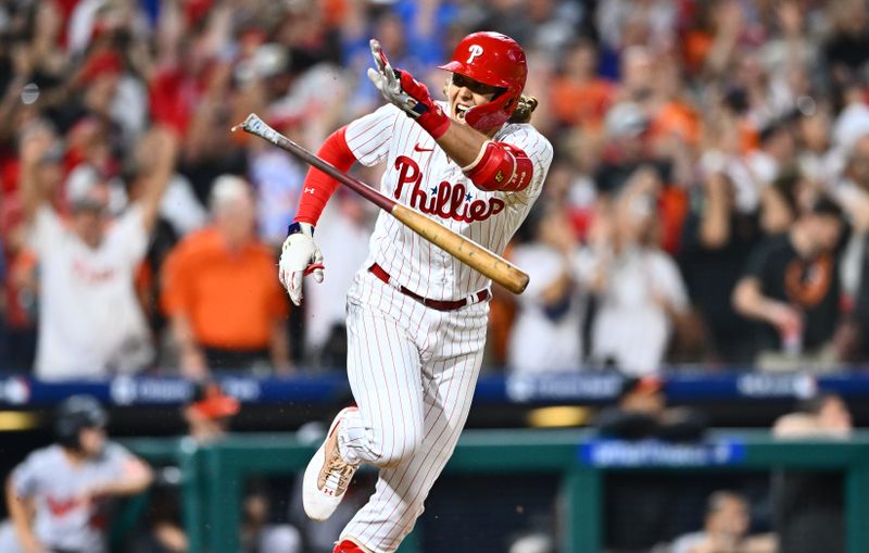 Jul 25, 2023; Philadelphia, Pennsylvania, USA; Philadelphia Phillies infielder Alec Bohm (28) tosses his bat after hitting a game-winning RBI single against the Baltimore Orioles in the ninth inning at Citizens Bank Park. Mandatory Credit: Kyle Ross-USA TODAY Sports