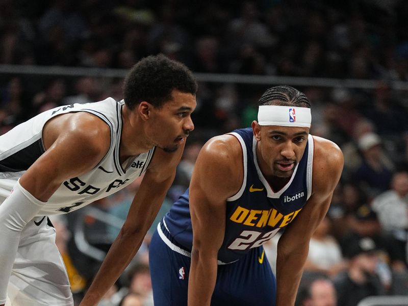 AUSTIN, TX - MARCH 15: Zeke Nnaji #22 of the Denver Nuggets and Victor Wembanyama #1 of the San Antonio Spurs look on during the game on March 15, 2024 at the Moody Center in Austin, Texas. NOTE TO USER: User expressly acknowledges and agrees that, by downloading and/or using this Photograph, user is consenting to the terms and conditions of the Getty Images License Agreement. Mandatory Copyright Notice: Copyright 2024 NBAE (Photo by Garrett Ellwood/NBAE via Getty Images)