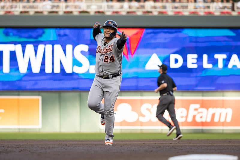 Aug 15, 2023; Minneapolis, Minnesota, USA; Detroit Tigers designated hitter Miguel Cabrera (24) celebrates after hitting a two-run home run during the second inning against the Minnesota Twins at Target Field. Mandatory Credit: Jordan Johnson-USA TODAY Sports