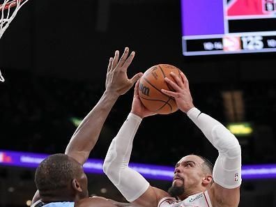 MEMPHIS, TENNESSEE - DECEMBER 15: Dillon Brooks #9 of the Houston Rockets goes to the basket against Bismack Biyombo #18 of the Memphis Grizzlies during the second half at FedExForum on December 15, 2023 in Memphis, Tennessee. NOTE TO USER: User expressly acknowledges and agrees that, by downloading and or using this photograph, User is consenting to the terms and conditions of the Getty Images License Agreement. (Photo by Justin Ford/Getty Images)