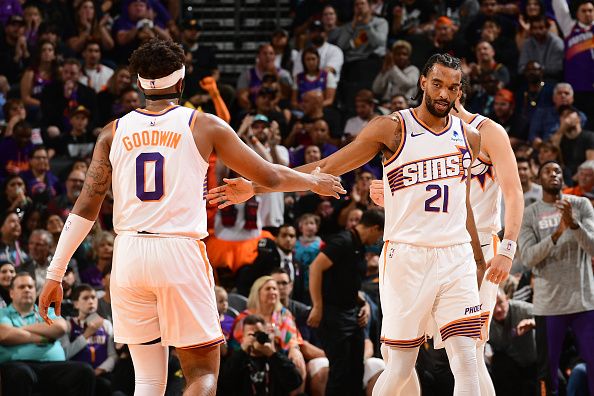 PHOENIX, AZ - NOVEMBER  12:  Keita Bates-Diop #21 and Jordan Goodwin #0 of the Phoenix Suns react during the game against the Oklahoma City Thunder on November 12, 2023 at Footprint Center in Phoenix, Arizona. NOTE TO USER: User expressly acknowledges and agrees that, by downloading and or using this photograph, user is consenting to the terms and conditions of the Getty Images License Agreement. Mandatory Copyright Notice: Copyright 2023 NBAE (Photo by Kate Frese/NBAE via Getty Images)