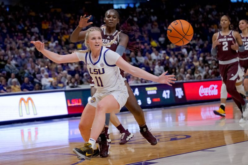 Jan 11, 2024; Baton Rouge, Louisiana, USA; LSU Lady Tigers guard Hailey Van Lith (11) has the ball get away from her next to Texas A&M Aggies guard Aicha Coulibaly (5) during the second half at Pete Maravich Assembly Center. Mandatory Credit: Matthew Hinton-USA TODAY Sports