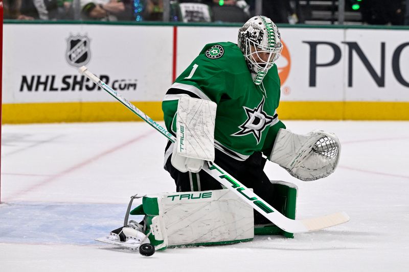 May 29, 2025; Dallas, Texas, USA; Dallas Stars goaltender Casey DeSmith (1) makes a save against the Edmonton Oilers during the first period in game five of the Western Conference Final of the 2025 Stanley Cup Playoffs at American Airlines Center. Mandatory Credit: Jerome Miron-Imagn Images