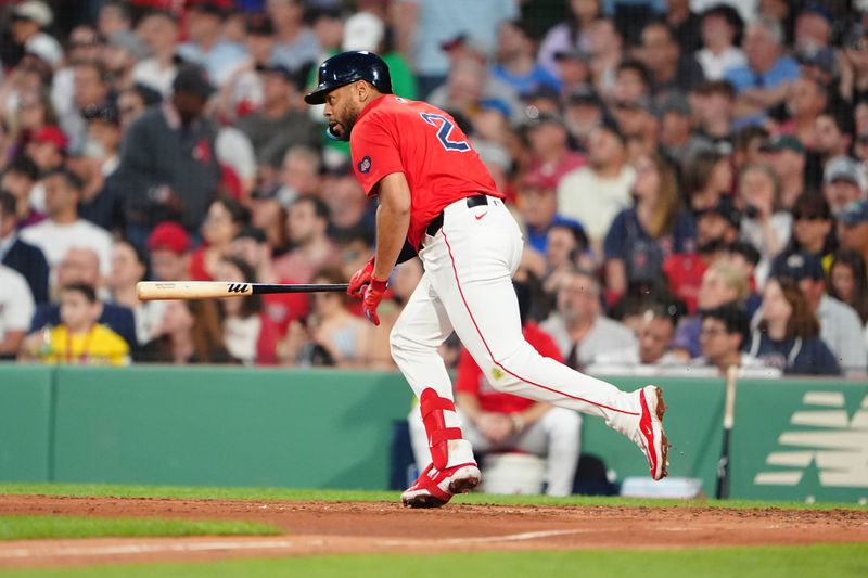 May 24, 2024; Boston, Massachusetts, USA; Boston Red Sox first baseman Dominic Smith (2) runs out a single against the Milwaukee Brewers during the fourth inning at Fenway Park. Mandatory Credit: Gregory Fisher-USA TODAY Sports