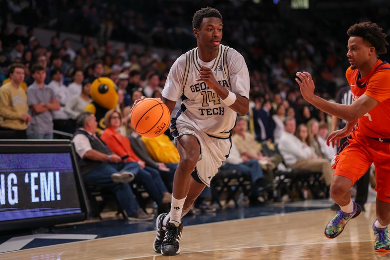 Jan 24, 2026; Atlanta, Georgia, USA; Georgia Tech Yellow Jackets forward Kowacie Reeves Jr. (14) drives to the basket against the Clemson Tigers in the second half at McCamish Pavilion. Mandatory Credit: Brett Davis-Imagn Images
