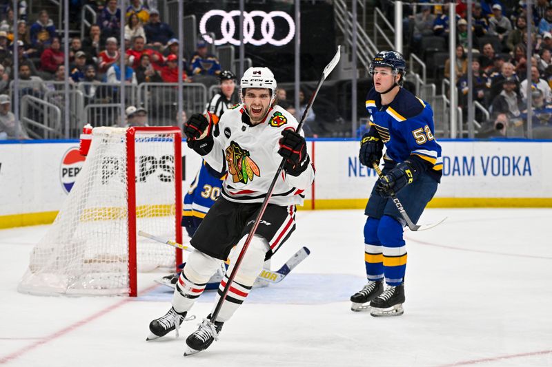 Apr 10, 2024; St. Louis, Missouri, USA;  Chicago Blackhawks left wing Landon Slaggert (84) reacts after scoring his first career NHL goal during the third period against the St. Louis Blues at Enterprise Center. Mandatory Credit: Jeff Curry-USA TODAY Sports