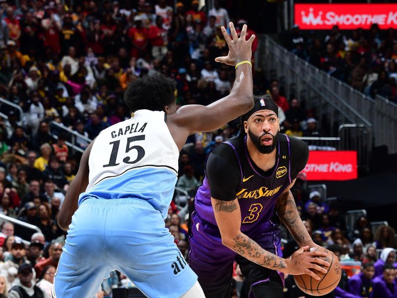 ATLANTA, GA - DECEMBER 6: Anthony Davis #3 of the Los Angeles Lakers handles the ball during the game against the Atlanta Hawks on December 6, 2024 at State Farm Arena in Atlanta, Georgia.  NOTE TO USER: User expressly acknowledges and agrees that, by downloading and/or using this Photograph, user is consenting to the terms and conditions of the Getty Images License Agreement. Mandatory Copyright Notice: Copyright 2024 NBAE (Photo by Scott Cunningham/NBAE via Getty Images)