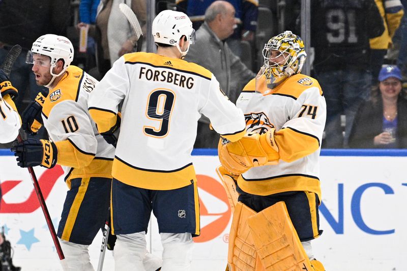 Feb 17, 2024; St. Louis, Missouri, USA; Nashville Predators left wing Filip Forsberg (9) congratulates goaltender Juuse Saros (74) after defeating the St. Louis Blues at Enterprise Center. Mandatory Credit: Jeff Le-USA TODAY Sports