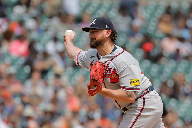 Jun 14, 2023; Detroit, Michigan, USA;  Atlanta Braves relief pitcher Kirby Yates (22) pitches in the sixth inning against the Detroit Tigers at Comerica Park. Mandatory Credit: Rick Osentoski-USA TODAY Sports