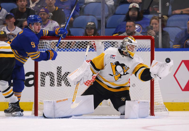 Sep 21, 2024; Buffalo, New York, USA;  Pittsburgh Penguins goalie Filip Larsson (31) makes a save during the third period against the Buffalo Sabres at KeyBank Center. Mandatory Credit: Timothy T. Ludwig-Imagn Images