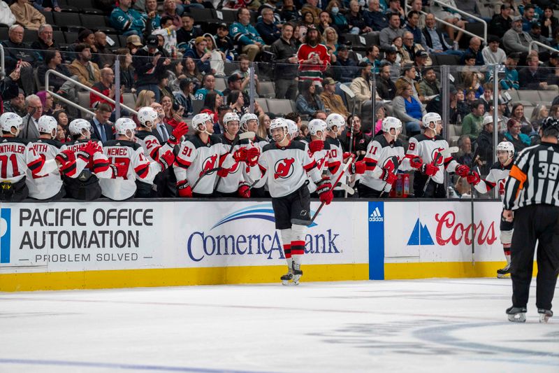 Feb 27, 2024; San Jose, California, USA;  New Jersey Devils defenseman Kevin Bahl (88) celebrates with teammates after the goal during the second period against the San Jose Sharks at SAP Center at San Jose. Mandatory Credit: Neville E. Guard-USA TODAY Sports