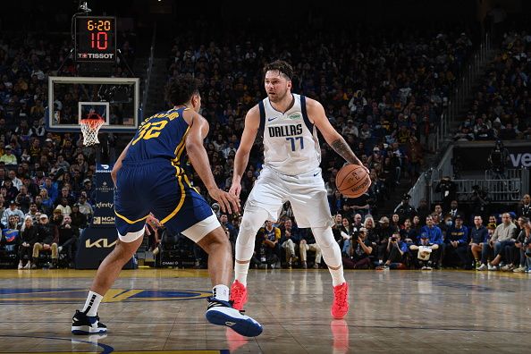 SAN FRANCISCO, CA - DECEMBER 30: Luka Doncic #77 of the Dallas Mavericks dribbles the ball during the game against the Golden State Warriors on December 30, 2023 at Chase Center in San Francisco, California. NOTE TO USER: User expressly acknowledges and agrees that, by downloading and or using this photograph, user is consenting to the terms and conditions of Getty Images License Agreement. Mandatory Copyright Notice: Copyright 2023 NBAE (Photo by Noah Graham/NBAE via Getty Images)