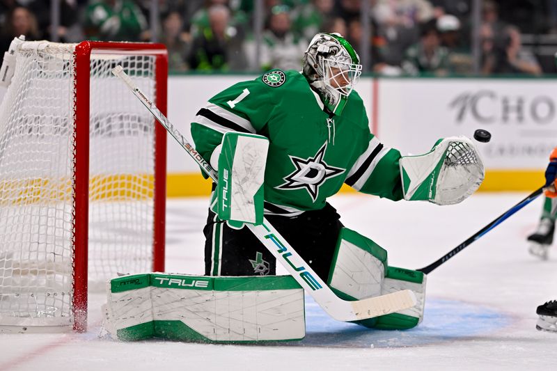 Nov 4, 2025; Dallas, Texas, USA; Dallas Stars goaltender Casey Desmith (1) makes a save on a Edmonton Oilers shot during the first period at the American Airlines Center. Mandatory Credit: Jerome Miron-Imagn Images
