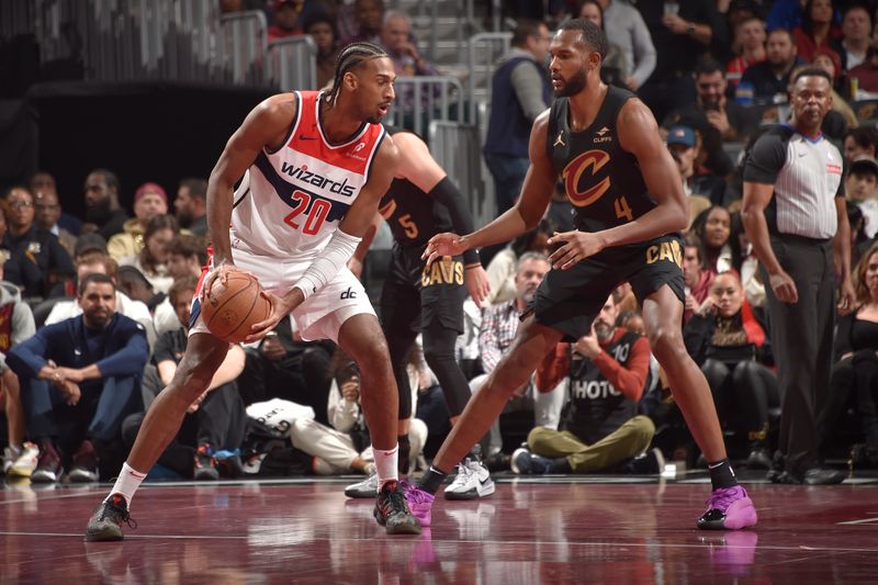 CLEVELAND, OH - NOVEMBER 03: Alexandre Sarr #20 of the Washington Wizards handles the ball during the game against the Cleveland Cavaliers during the Emirates NBA Cup game on November 03, 2024 at Rocket Mortgage FieldHouse in Cleveland, Ohio. NOTE TO USER: User expressly acknowledges and agrees that, by downloading and/or using this Photograph, user is consenting to the terms and conditions of the Getty Images License Agreement. Mandatory Copyright Notice: Copyright 2024 NBAE (Photo by David Liam Kyle/NBAE via Getty Images)