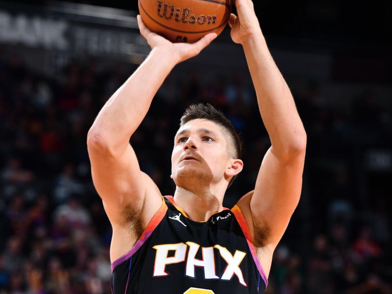 PHOENIX, AZ - DECEMBER 3: Grayson Allen #8 of the Phoenix Suns shoots a free throw during the game against the San Antonio Spurs during a Emirates NBA Cup game on December 3, 2024 at Footprint Center in Phoenix, Arizona. NOTE TO USER: User expressly acknowledges and agrees that, by downloading and or using this photograph, user is consenting to the terms and conditions of the Getty Images License Agreement. Mandatory Copyright Notice: Copyright 2024 NBAE (Photo by Barry Gossage/NBAE via Getty Images)