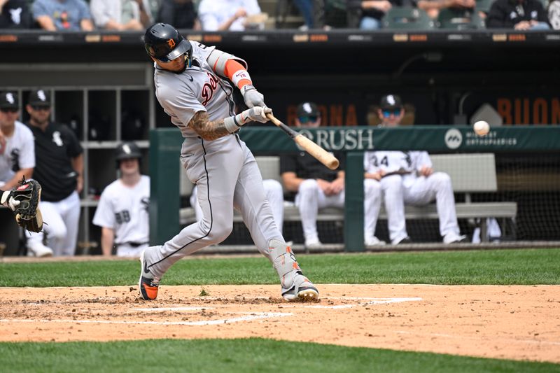 Jun 5, 2025; Chicago, Illinois, USA;  Detroit Tigers outfielder Javier Báez (28) singles against the Chicago White Sox during the fifth inning at Rate Field. Mandatory Credit: Matt Marton-Imagn Images