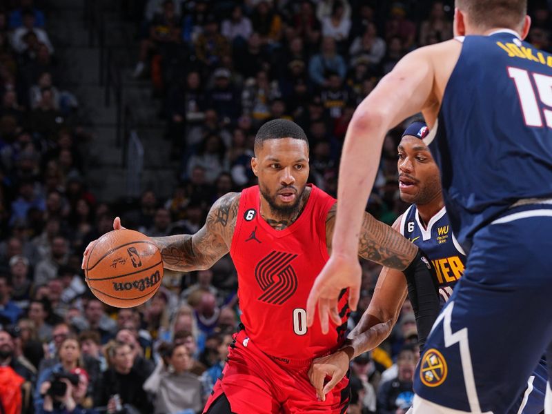 DENVER, CO - JANUARY 17: Damian Lillard #0 of the Portland Trail Blazers drives to the basket during the game against the Denver Nuggets on January 17, 2023 at the Ball Arena in Denver, Colorado. NOTE TO USER: User expressly acknowledges and agrees that, by downloading and/or using this Photograph, user is consenting to the terms and conditions of the Getty Images License Agreement. Mandatory Copyright Notice: Copyright 2023 NBAE (Photo by Bart Young/NBAE via Getty Images)