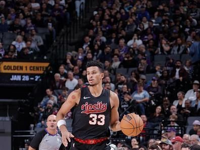 SACRAMENTO, CA - NOVEMBER 8: Toumani Camara #33 of the Portland Trail Blazers dribbles the ball during the game against the Sacramento Kings on November 8, 2023 at Golden 1 Center in Sacramento, California. NOTE TO USER: User expressly acknowledges and agrees that, by downloading and or using this Photograph, user is consenting to the terms and conditions of the Getty Images License Agreement. Mandatory Copyright Notice: Copyright 2023 NBAE (Photo by Rocky Widner/NBAE via Getty Images)