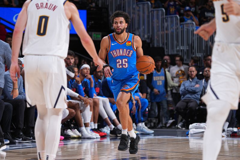 DENVER, CO - OCTOBER 15: Ajay Mitchell #25 of the Oklahoma City Thunder dribbles the ball during the game against the Denver Nuggets during a NBA preseason game on October 15, 2024 at Ball Arena in Denver, Colorado. NOTE TO USER: User expressly acknowledges and agrees that, by downloading and/or using this Photograph, user is consenting to the terms and conditions of the Getty Images License Agreement. Mandatory Copyright Notice: Copyright 2024 NBAE (Photo by Garrett Ellwood/NBAE via Getty Images)