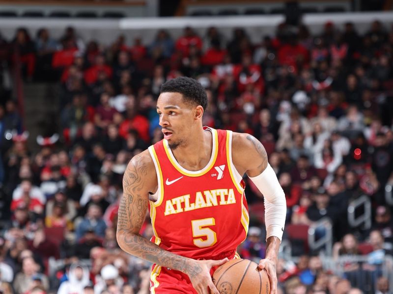 CHICAGO, IL - APRIL 1: Dejounte Murray #5 of the Atlanta Hawks looks to pass the ball during the game against the Chicago Bulls on April 1, 2024 at United Center in Chicago, Illinois. NOTE TO USER: User expressly acknowledges and agrees that, by downloading and or using this photograph, User is consenting to the terms and conditions of the Getty Images License Agreement. Mandatory Copyright Notice: Copyright 2024 NBAE (Photo by Jeff Haynes/NBAE via Getty Images)