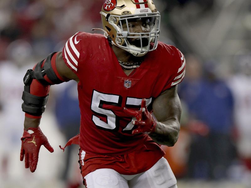 San Francisco 49ers linebacker Dre Greenlaw (57) looks into the backfield during an NFL football game against the New York Giants, Thursday, Sept. 21, 2023, in Santa Clara, Calif. (AP Photo/Scot Tucker)