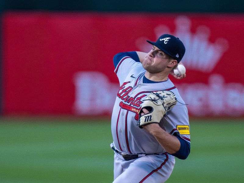 May 30, 2023; Oakland, California, USA;  Atlanta Braves starting pitcher Bryce Elder (55) delivers a pitch against the Oakland Athletics during the first inning at Oakland-Alameda County Coliseum. Mandatory Credit: Neville E. Guard-USA TODAY Sports