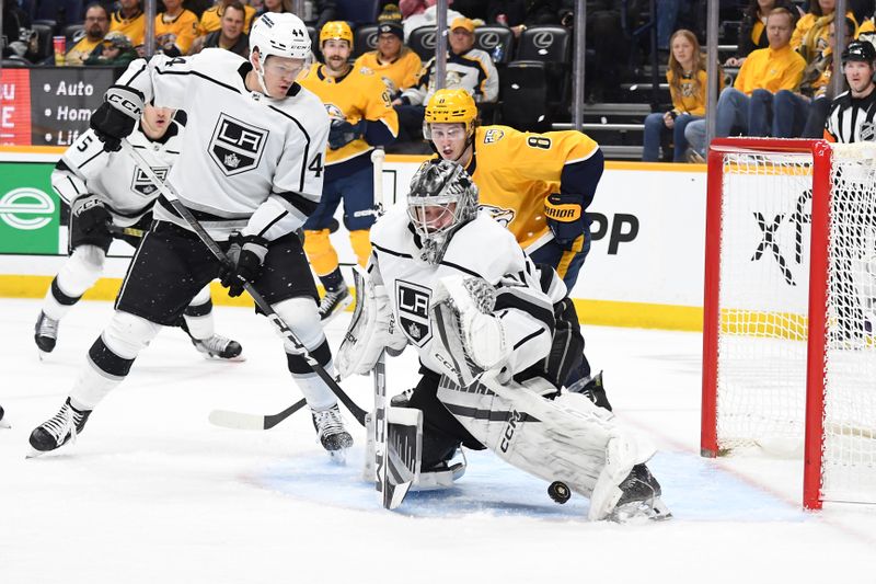 Jan 31, 2024; Nashville, Tennessee, USA; Los Angeles Kings goaltender David Rittich (31) makes a save during the third period against the Nashville Predators at Bridgestone Arena. Mandatory Credit: Christopher Hanewinckel-USA TODAY Sports