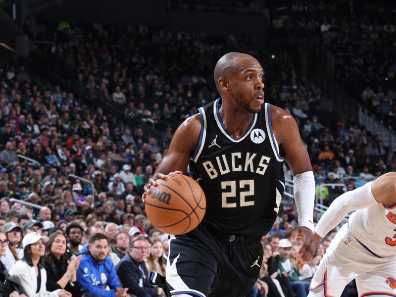 MILWAUKEE, WI - APRIL 7: Khris Middleton #22 of the Milwaukee Bucks dribbles the ball during the game against the New York Knicks on April 7, 2024 at the Fiserv Forum Center in Milwaukee, Wisconsin. NOTE TO USER: User expressly acknowledges and agrees that, by downloading and or using this Photograph, user is consenting to the terms and conditions of the Getty Images License Agreement. Mandatory Copyright Notice: Copyright 2024 NBAE (Photo by Jeff Haynes/NBAE via Getty Images).