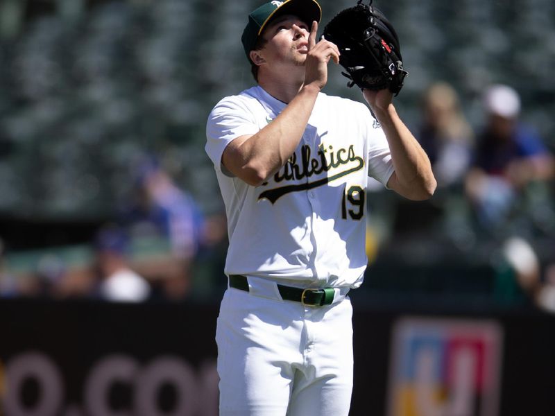 May 8, 2024; Oakland, California, USA; Oakland Athletics pitcher Mason Miller (19) celebrates getting the final out against the Texas Rangers during the ninth inning at Oakland-Alameda County Coliseum. Mandatory Credit: D. Ross Cameron-USA TODAY Sports