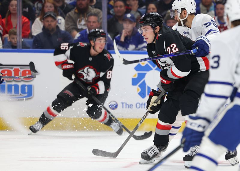 Oct 24, 2025; Buffalo, New York, USA;  Buffalo Sabres right wing Jack Quinn (22) looks to get open during the second period against the Toronto Maple Leafs at KeyBank Center. Mandatory Credit: Timothy T. Ludwig-Imagn Images