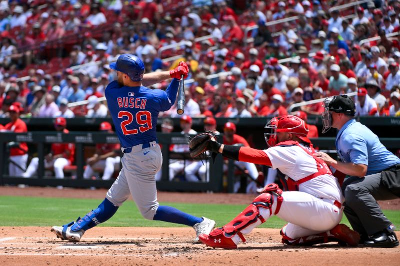 Jun 26, 2025; St. Louis, Missouri, USA;  Chicago Cubs first baseman Michael Busch (29) hits a solo home run against the St. Louis Cardinals during the second inning at Busch Stadium. Mandatory Credit: Jeff Curry-Imagn Images