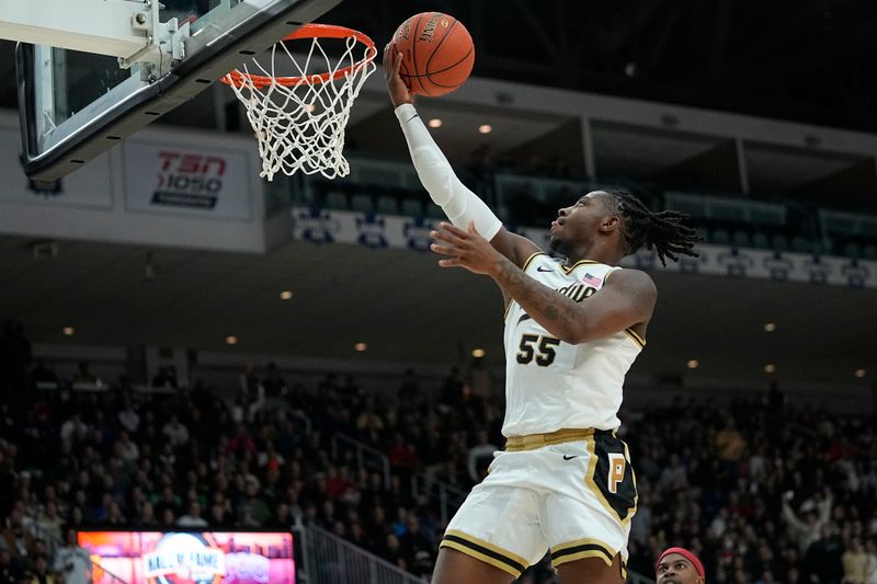 Dec 9, 2023; Toronto, Ontario, CAN; Purdue Boilermakers guard Lance Jones (55) makes a basket against the Alabama Crimson Tide during the second half at Coca-Cola Coliseum. Mandatory Credit: John E. Sokolowski-USA TODAY Sports