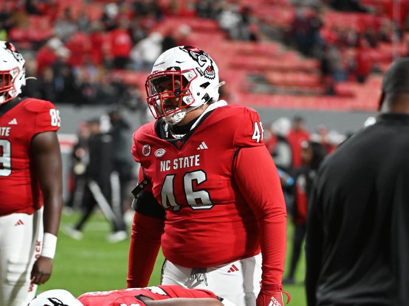 Nov 25, 2023; Raleigh, North Carolina, USA;  North Carolina State Wolfpack defensive tackle Nick Campbell (46) warms up prior to a game against the North Carolina Tar Heels at Carter-Finley Stadium. Mandatory Credit: Rob Kinnan-USA TODAY Sports