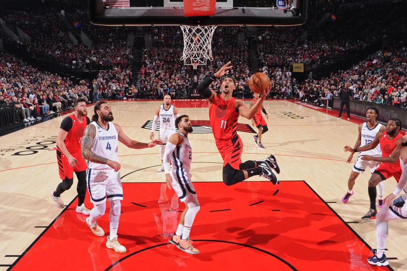 PORTLAND, OR - NOVEMBER 2: Josh Hart #11 of the Portland Trail Blazers drives to the basket against the Memphis Grizzlies on November 2, 2022 at the Moda Center Arena in Portland, Oregon. NOTE TO USER: User expressly acknowledges and agrees that, by downloading and or using this photograph, user is consenting to the terms and conditions of the Getty Images License Agreement. Mandatory Copyright Notice: Copyright 2022 NBAE (Photo by Sam Forencich/NBAE via Getty Images)