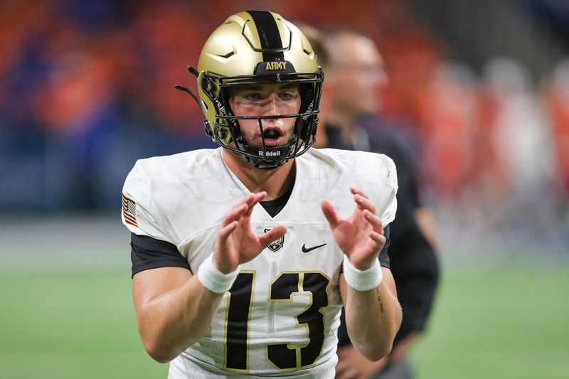 Sep 15, 2023; San Antonio, Texas, USA; Army Black Knights quarterback Bryson Daily (13) warms up before the first half against the UTSA Roadrunners at the Alamodome. Mandatory Credit: Danny Wild-USA TODAY Sports