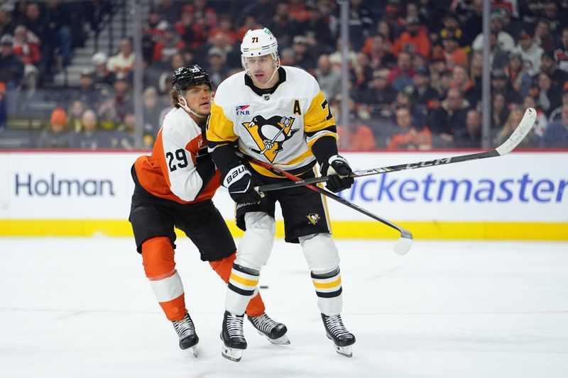 Dec 1, 2025; Philadelphia, Pennsylvania, USA; Philadelphia Flyers right wing Nikita Grebenkin (29) collides with Pittsburgh Penguins center Evgeni Malkin (71) in the first period at Xfinity Mobile Arena. Mandatory Credit: Kyle Ross-Imagn Images