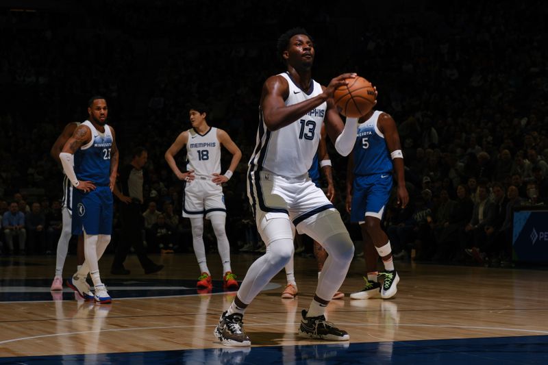 MINNEAPOLIS, MN -  FEBRUARY 28: Jaren Jackson Jr. #13 of the Memphis Grizzlies shoots a free throw during the game on February 28, 2024 at Target Center in Minneapolis, Minnesota. NOTE TO USER: User expressly acknowledges and agrees that, by downloading and or using this Photograph, user is consenting to the terms and conditions of the Getty Images License Agreement. Mandatory Copyright Notice: Copyright 2024 NBAE (Photo by David Sherman/NBAE via Getty Images)