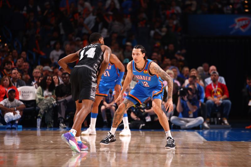 OKLAHOMA CITY, OK - APRIL 10:  Lindy Waters III #12 of the Oklahoma City Thunder plays defense against the San Antonio Spurs on April 10, 2024 at Paycom Arena in Oklahoma City, Oklahoma. NOTE TO USER: User expressly acknowledges and agrees that, by downloading and or using this photograph, User is consenting to the terms and conditions of the Getty Images License Agreement. Mandatory Copyright Notice: Copyright 2024 NBAE (Photo by Zach Beeker/NBAE via Getty Images)